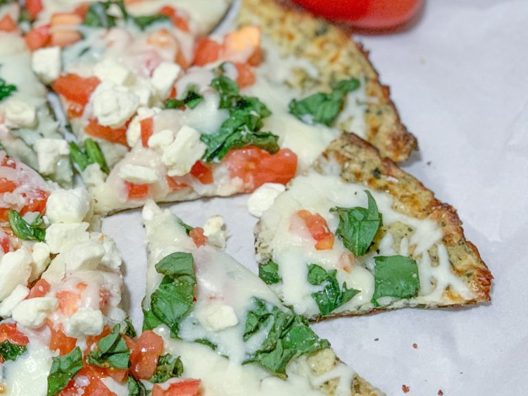 This cauliflower pizza crust is the best and you can top it with your favorite pizza ingredients for the tastiest low carb lunch or dinner option! #easy #recipe #low #carb #lowcarb #keto # healthy #vegan #vegetarian #how #to #make