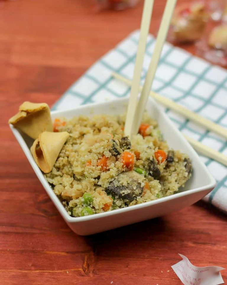 Cauliflower fried rice with shrimp is the perfect alternative to ordering takeout. This is lower carb and healthier version, that still taste absolutely mouthwatering. #Cauliflower #Soy #Sauce #Low #Carb #Peas #shrimp #Stir #Fry #Veggies