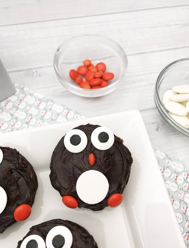 Christmas penguin brownies are such an adorable and delicious dessert to serve up to your family and friends. You have a fudgy homemade brownie that is decorated with candies to resemble a penguin.