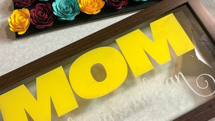 open paper rose shadow box with yellow mom