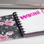 dollar tree binder with sticker on the plain side that says important cut into personal planner dividers for the happy planner