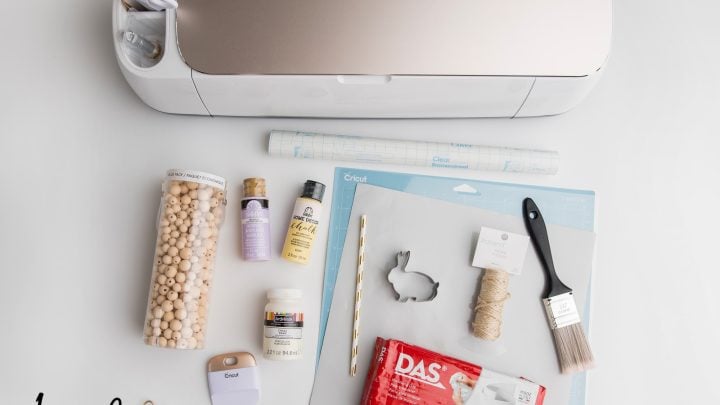 champaign cricut maker with all the supplies to make a personalized easter basket