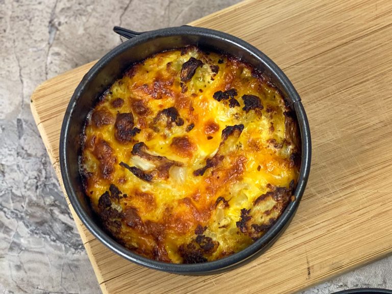 baking pan with keto mac and cheese cooked until golden brown